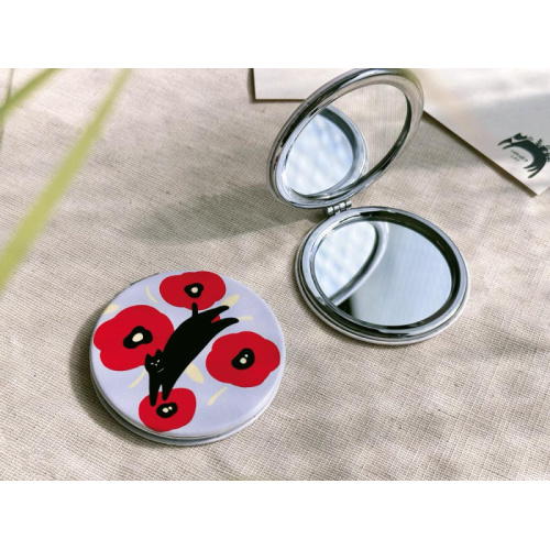 藍底紅花/黑貓